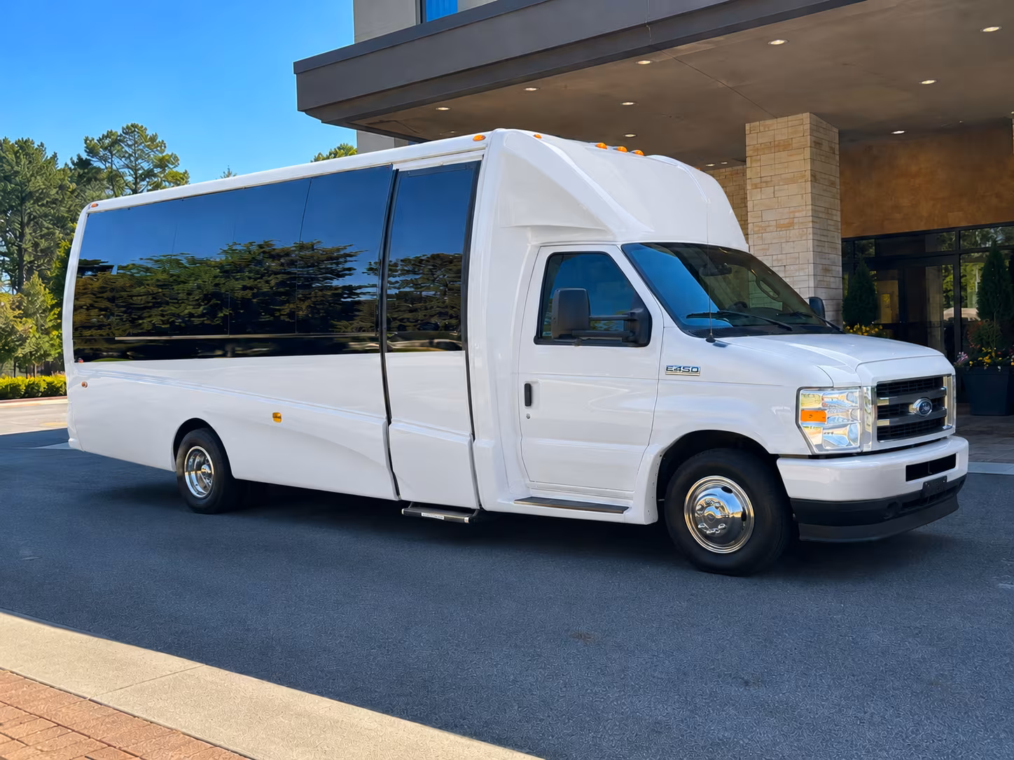group boarding a minibus in round rock